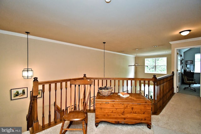 1015 Greenes Way Cir, Collegeville, PA 19426 - living area with carpet flooring, ornamental molding, and an upstairs landing