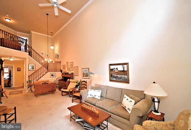 1015 Greenes Way Cir, Collegeville, PA 19426 - living area with high vaulted ceiling, ceiling fan, carpet, crown molding, and stairs