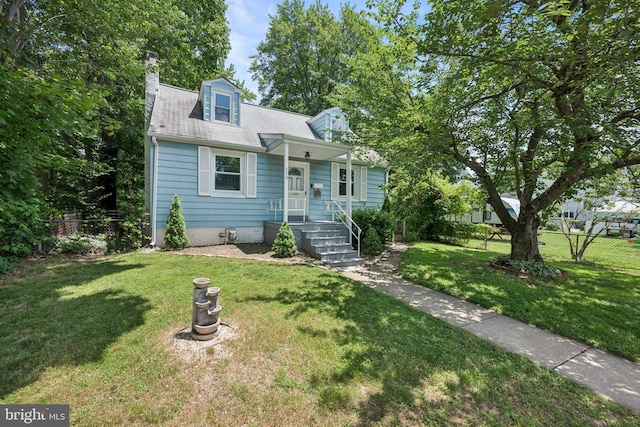 515 N Walnut Ave, Magnolia, NJ 08049 - cape cod home featuring a chimney