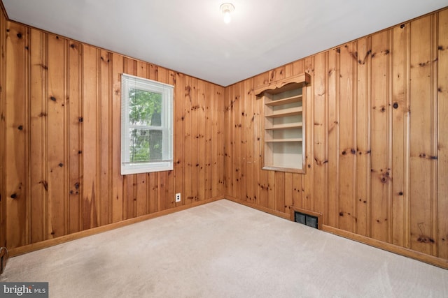 515 N Walnut Ave, Magnolia, NJ 08049 - carpeted empty room featuring wooden walls