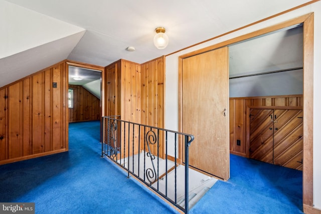 515 N Walnut Ave, Magnolia, NJ 08049 - additional living space featuring carpet flooring, vaulted ceiling, and wooden walls