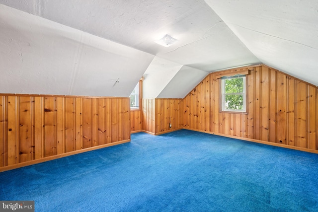 515 N Walnut Ave, Magnolia, NJ 08049 - bonus room with wooden walls, vaulted ceiling, and carpet floors