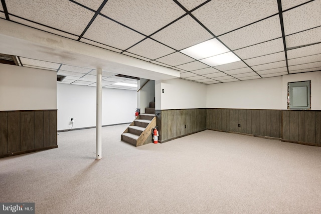 515 N Walnut Ave, Magnolia, NJ 08049 - finished below grade area featuring a drop ceiling, wainscoting, carpet, wooden walls, and stairway