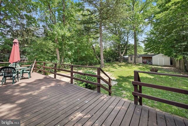 515 N Walnut Ave, Magnolia, NJ 08049 - deck featuring a shed, outdoor dining space, a fenced backyard, and view of scattered trees