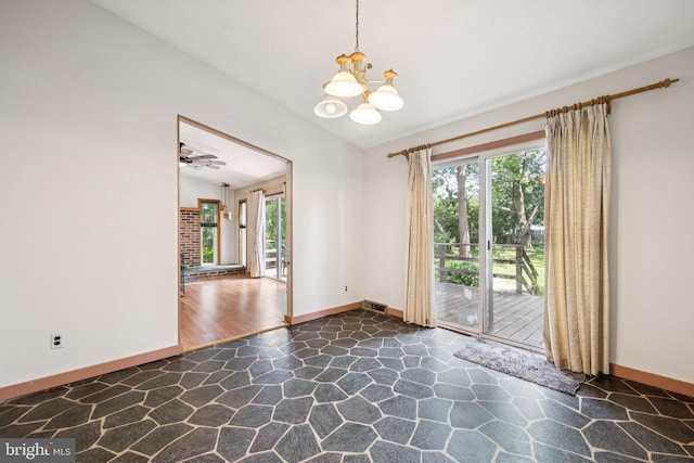 515 N Walnut Ave, Magnolia, NJ 08049 - spare room with stone floors, a chandelier, and lofted ceiling