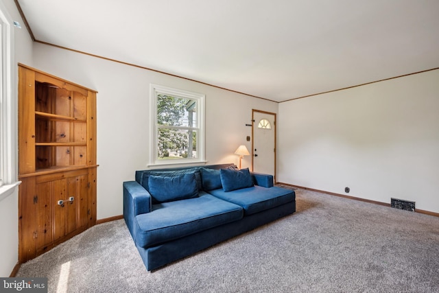 515 N Walnut Ave, Magnolia, NJ 08049 - carpeted living room featuring baseboards and ornamental molding