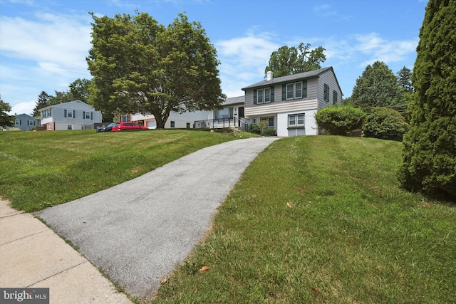 301 W Marshall St, West Chester, PA 19380 - split level home featuring a front lawn and driveway