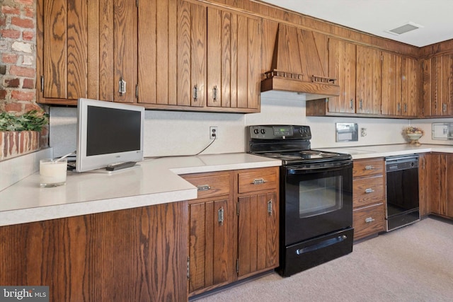 301 W Marshall St, West Chester, PA 19380 - kitchen with black appliances, brown cabinetry, light countertops, and custom exhaust hood