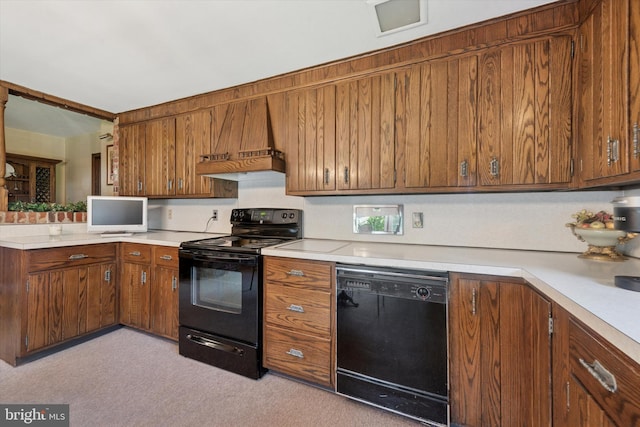301 W Marshall St, West Chester, PA 19380 - kitchen featuring black appliances, brown cabinets, and light countertops