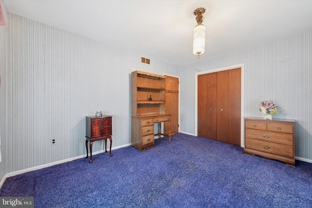 301 W Marshall St, West Chester, PA 19380 - carpeted bedroom with a closet and wallpapered walls