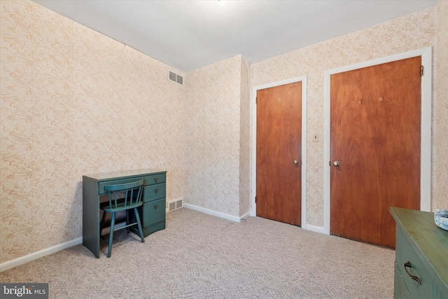 301 W Marshall St, West Chester, PA 19380 - carpeted bedroom with wallpapered walls and baseboards