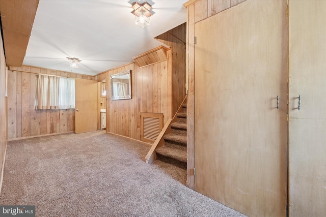 301 W Marshall St, West Chester, PA 19380 - carpeted foyer featuring wood walls and stairway