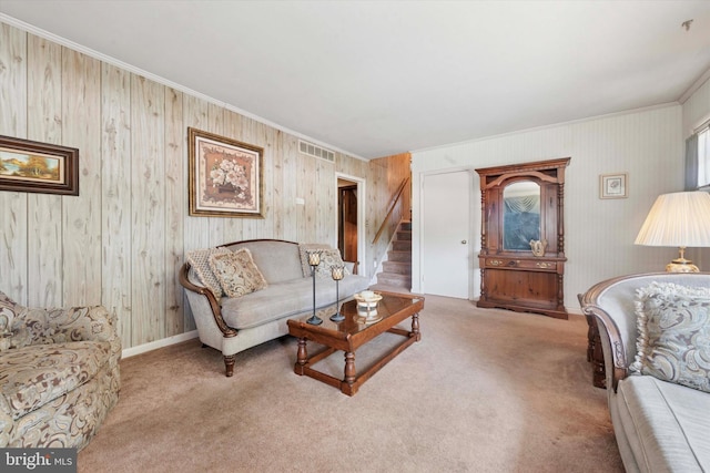301 W Marshall St, West Chester, PA 19380 - living area featuring carpet flooring, ornamental molding, stairs, and wooden walls