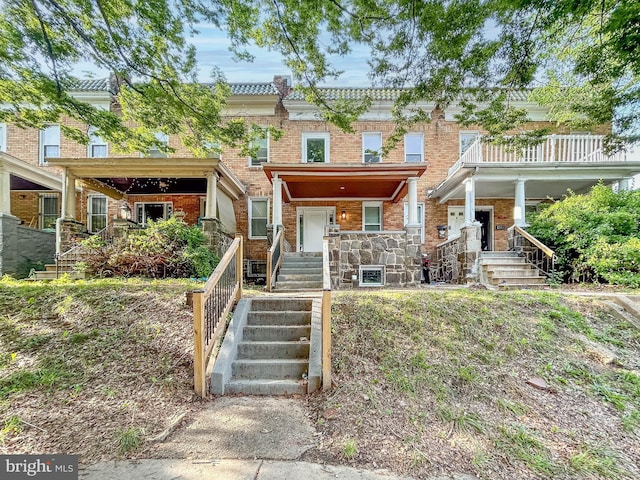 3302 Gwynns Falls Pkwy, Baltimore, MD 21216 - townhome / multi-family property featuring brick siding and covered porch