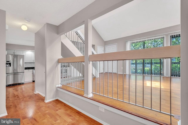 22 Witch Hazel Ct, Monmouth Junction, NJ 08852 - hallway with wood finished floors and lofted ceiling