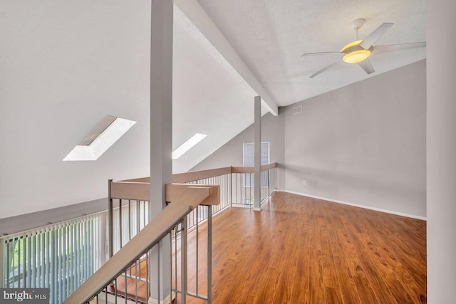 22 Witch Hazel Ct, Monmouth Junction, NJ 08852 - spare room featuring a skylight, wood finished floors, and a ceiling fan