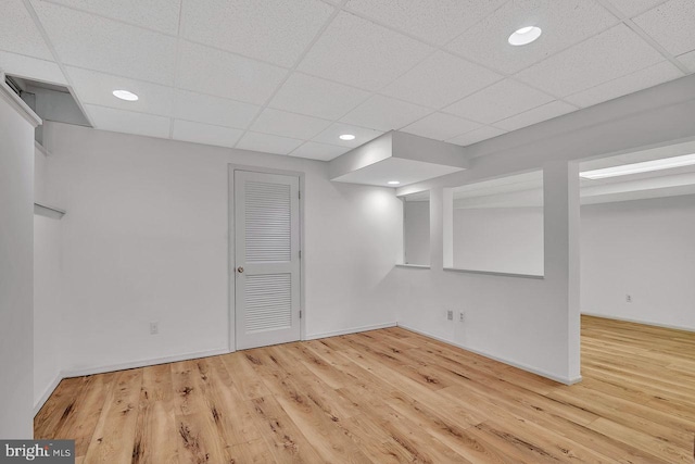 22 Witch Hazel Ct, Monmouth Junction, NJ 08852 - finished basement featuring a paneled ceiling, wood finished floors, and recessed lighting