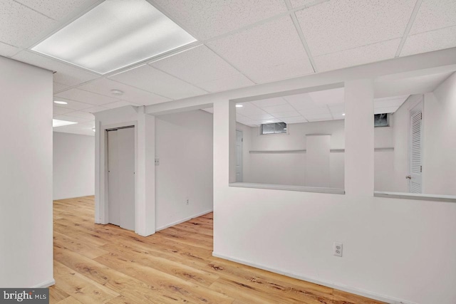 22 Witch Hazel Ct, Monmouth Junction, NJ 08852 - finished basement with a drop ceiling, wood finished floors, and recessed lighting