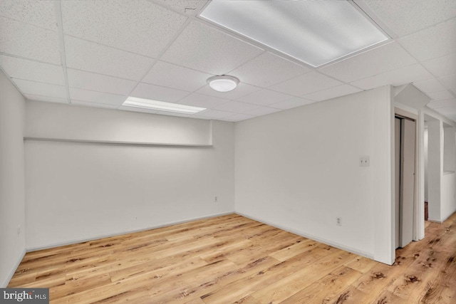 22 Witch Hazel Ct, Monmouth Junction, NJ 08852 - finished basement with a paneled ceiling and wood finished floors