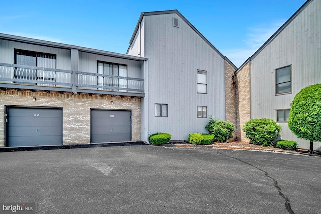 22 Witch Hazel Ct, Monmouth Junction, NJ 08852 - view of property featuring a garage and driveway