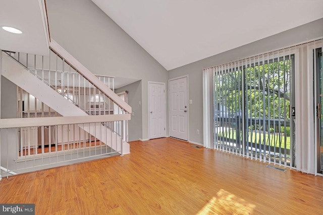 22 Witch Hazel Ct, Monmouth Junction, NJ 08852 - entrance foyer featuring stairs, wood finished floors, and high vaulted ceiling