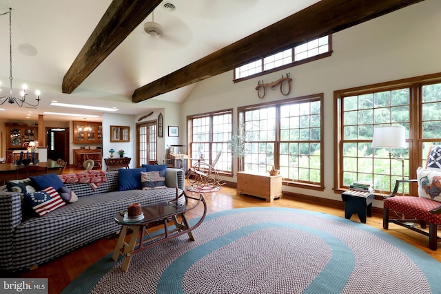 320 Hartswick Ave, State College, PA 16803 - living room with beam ceiling, wood finished floors, a chandelier, a high ceiling, and recessed lighting