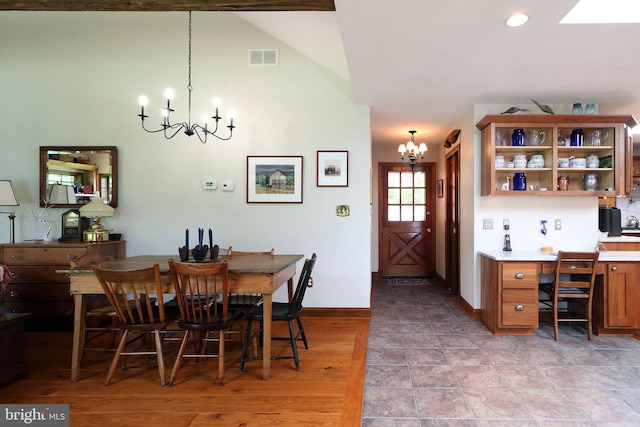 320 Hartswick Ave, State College, PA 16803 - dining room featuring a chandelier and high vaulted ceiling