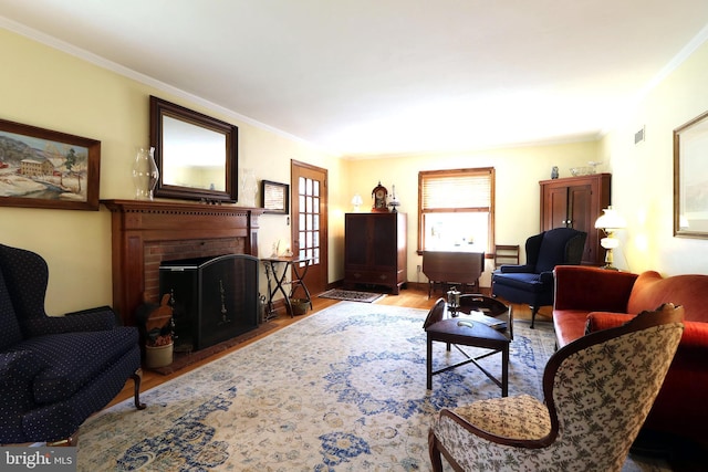 320 Hartswick Ave, State College, PA 16803 - living room featuring a fireplace, wood finished floors, and crown molding