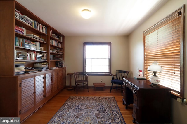 320 Hartswick Ave, State College, PA 16803 - living area featuring light wood finished floors and a desk