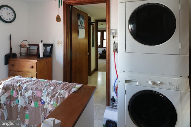 320 Hartswick Ave, State College, PA 16803 - laundry room with stacked washer / dryer and light tile patterned floors