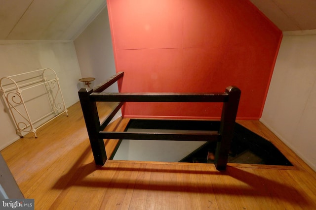 320 Hartswick Ave, State College, PA 16803 - stairs featuring wood finished floors and lofted ceiling