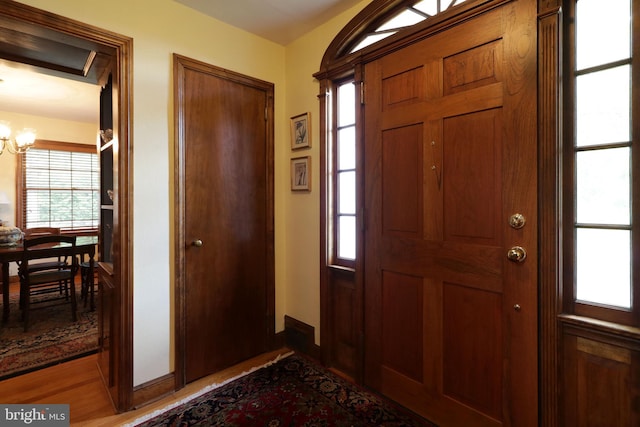 320 Hartswick Ave, State College, PA 16803 - foyer entrance with a chandelier and wood finished floors