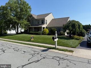 1309 Sterling Dr, York, PA 17404 - traditional-style house with a front yard and driveway