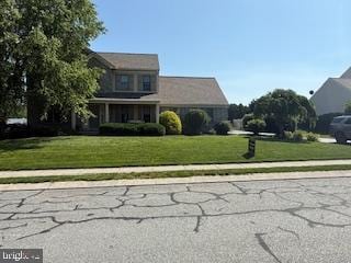 1309 Sterling Dr, York, PA 17404 - traditional-style house featuring a front yard
