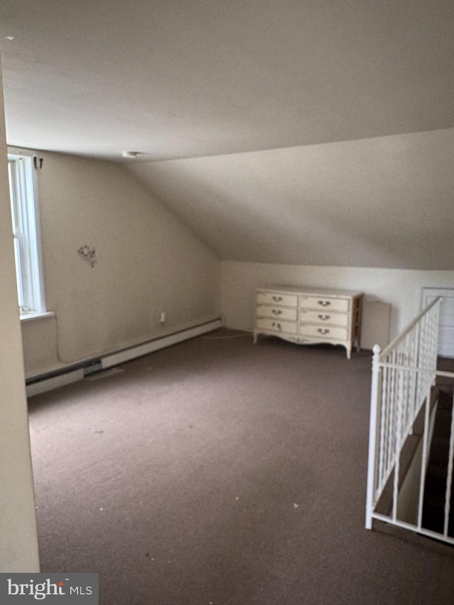 221 Buchanan Ave, Hamilton, NJ 08610 - additional living space with carpet flooring, vaulted ceiling, and a baseboard heating unit