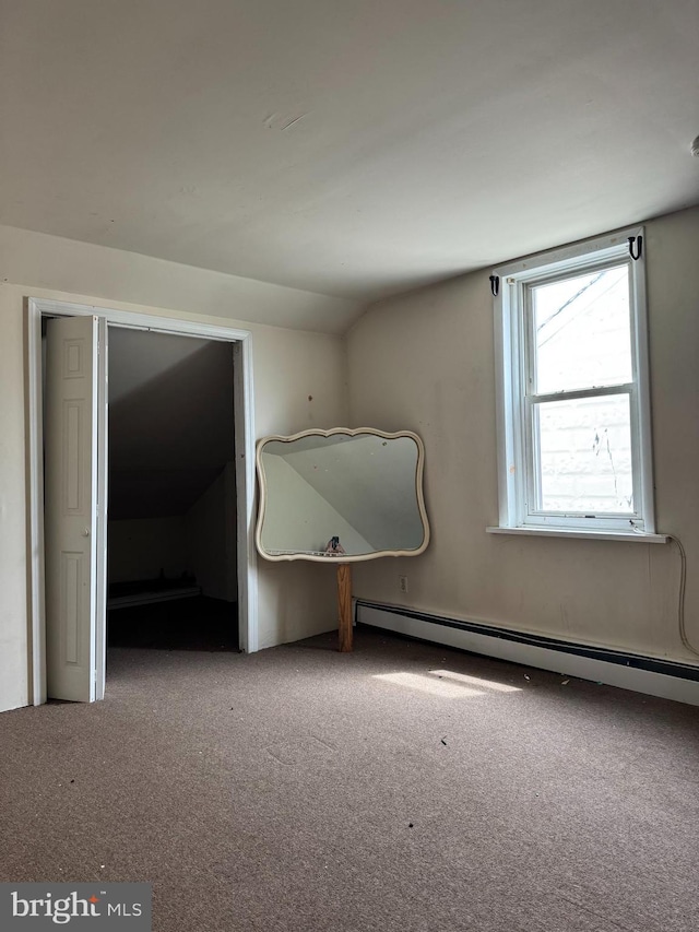 221 Buchanan Ave, Hamilton, NJ 08610 - empty room featuring carpet, baseboard heating, and lofted ceiling