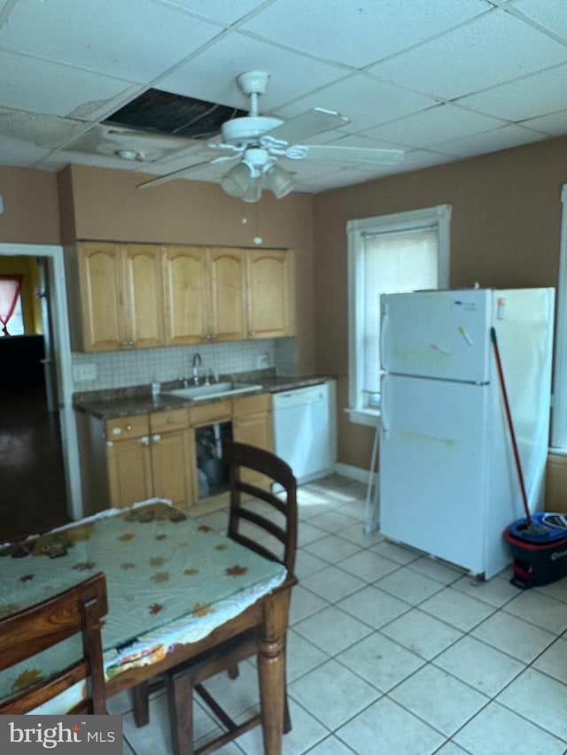 221 Buchanan Ave, Hamilton, NJ 08610 - kitchen featuring white appliances, light brown cabinetry, a paneled ceiling, backsplash, and light tile patterned flooring