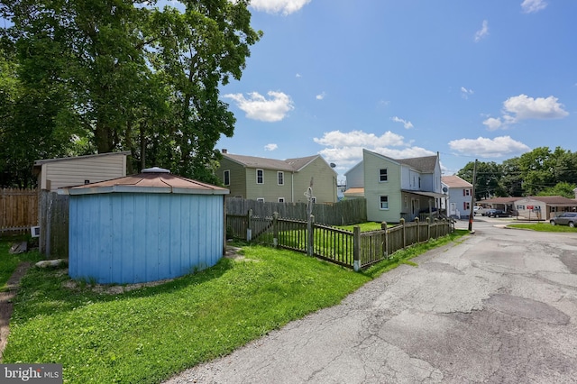 521 Concord Ln, Columbia, PA 17512 - fenced yard with a residential view and a storage unit