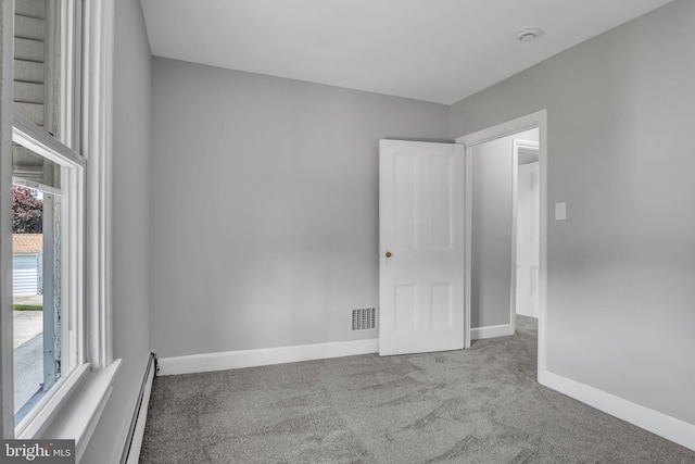 345-347 W Penn St, Carlisle, PA 17013 - unfurnished room with carpet floors, a baseboard radiator, and a smoke detector