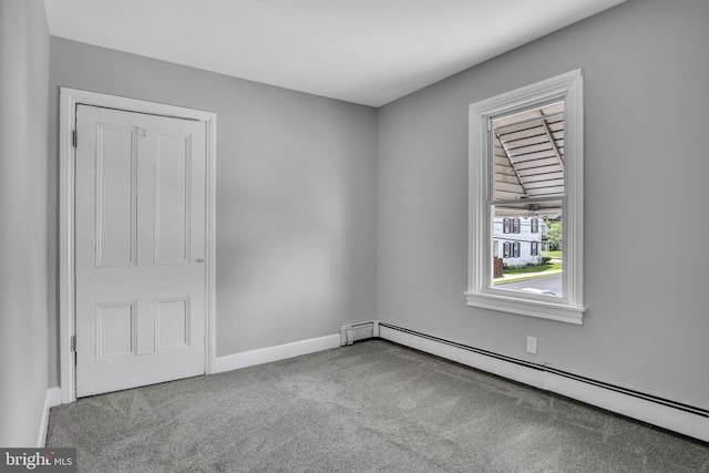 345-347 W Penn St, Carlisle, PA 17013 - carpeted spare room with a baseboard heating unit and baseboards