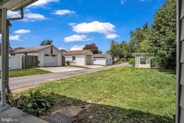 345-347 W Penn St, Carlisle, PA 17013 - view of yard with a detached garage and an outdoor structure
