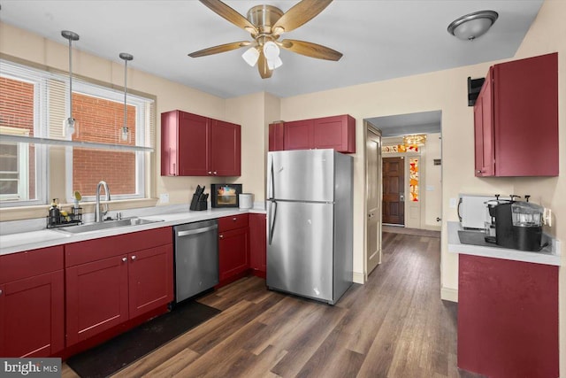 708 Maryland Ave, York, PA 17404 - kitchen with appliances with stainless steel finishes, dark wood-type flooring, ceiling fan, and light countertops