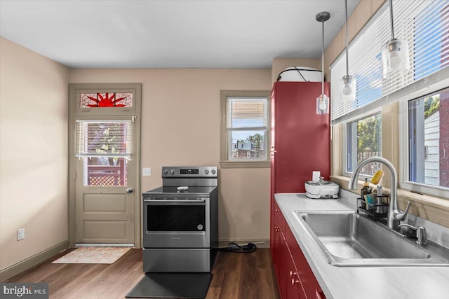 708 Maryland Ave, York, PA 17404 - kitchen featuring stainless steel range with electric stovetop, dark wood-style floors, and light countertops