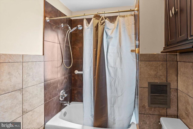 708 Maryland Ave, York, PA 17404 - bathroom with shower / tub combo with curtain, tile walls, and heating unit