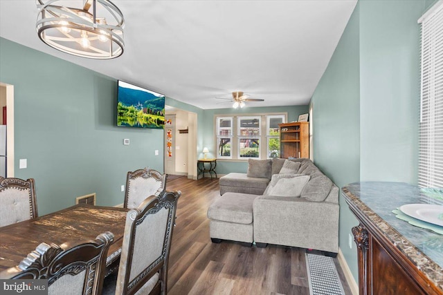 708 Maryland Ave, York, PA 17404 - living room featuring a chandelier, dark wood-type flooring, and ceiling fan