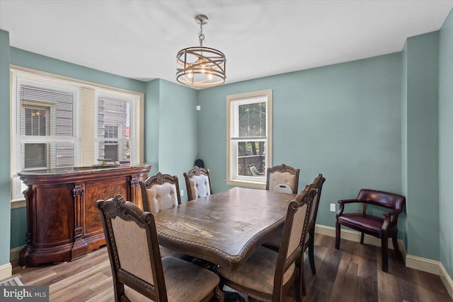 708 Maryland Ave, York, PA 17404 - dining space with wood finished floors, healthy amount of natural light, and a chandelier