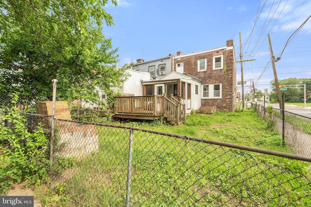 901 Fairview St, Camden, NJ 08104 - back of house with a deck, a fenced backyard, and brick siding