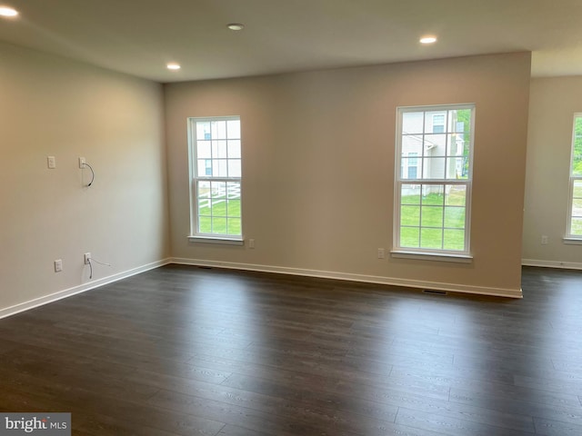 340 Coralroot Dr, Townsend, DE 19734 - spare room featuring dark wood finished floors, plenty of natural light, and recessed lighting