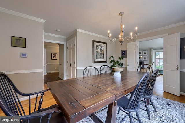 1228 Hunsicker Rd, Lancaster, PA 17601 - dining room with a chandelier, crown molding, and light wood-type flooring