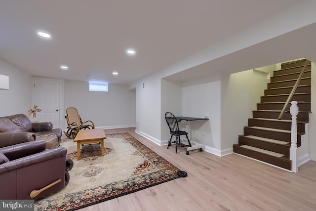 1228 Hunsicker Rd, Lancaster, PA 17601 - living room with wood finished floors, stairs, and recessed lighting